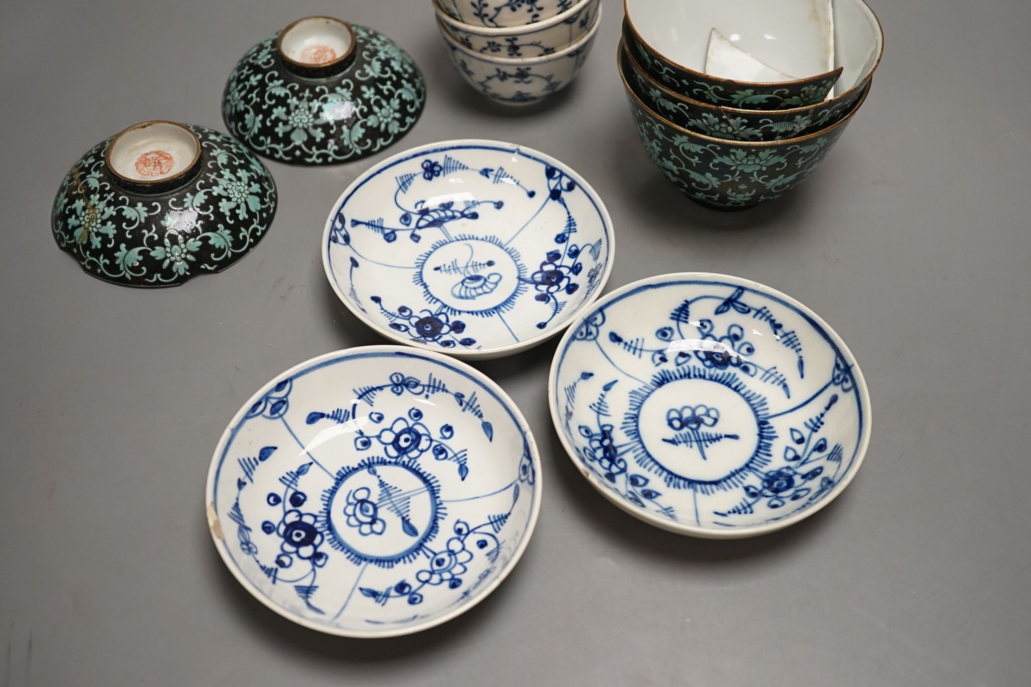A 19th century Chinese black ground porcelain bowls and two covers, together with an three onion pattern blue and white tea bowls and saucers a/f